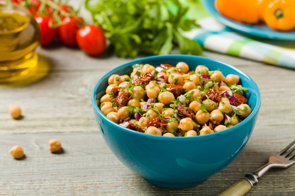 Chickpea salad with sundried tomatoes in a bowl.