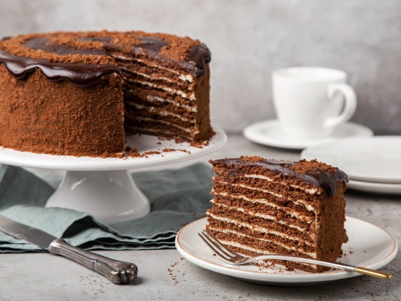 Chocolate-honey cake with a slice cut out.